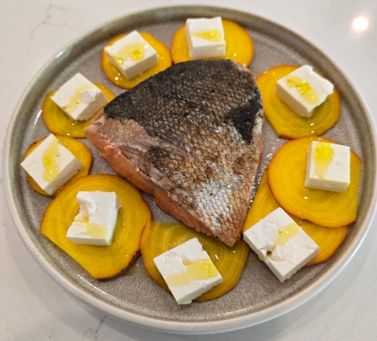 Salmon plate with sliced beet and cheese